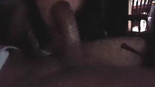 Enrapturing teenage black-haired is providing a hand job to her paramour, before deep throating his yam-sized cock