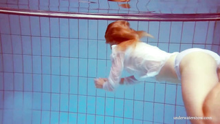 Crimson haired honey, Dashka is oftentimes swimming downright bare, not knowing that someone is eyeing her