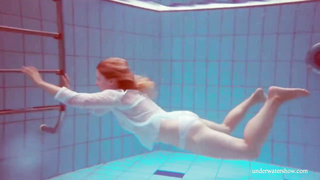 Crimson haired honey, Dashka is oftentimes swimming downright bare, not knowing that someone is eyeing her