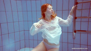 Crimson haired honey, Dashka is oftentimes swimming downright bare, not knowing that someone is eyeing her